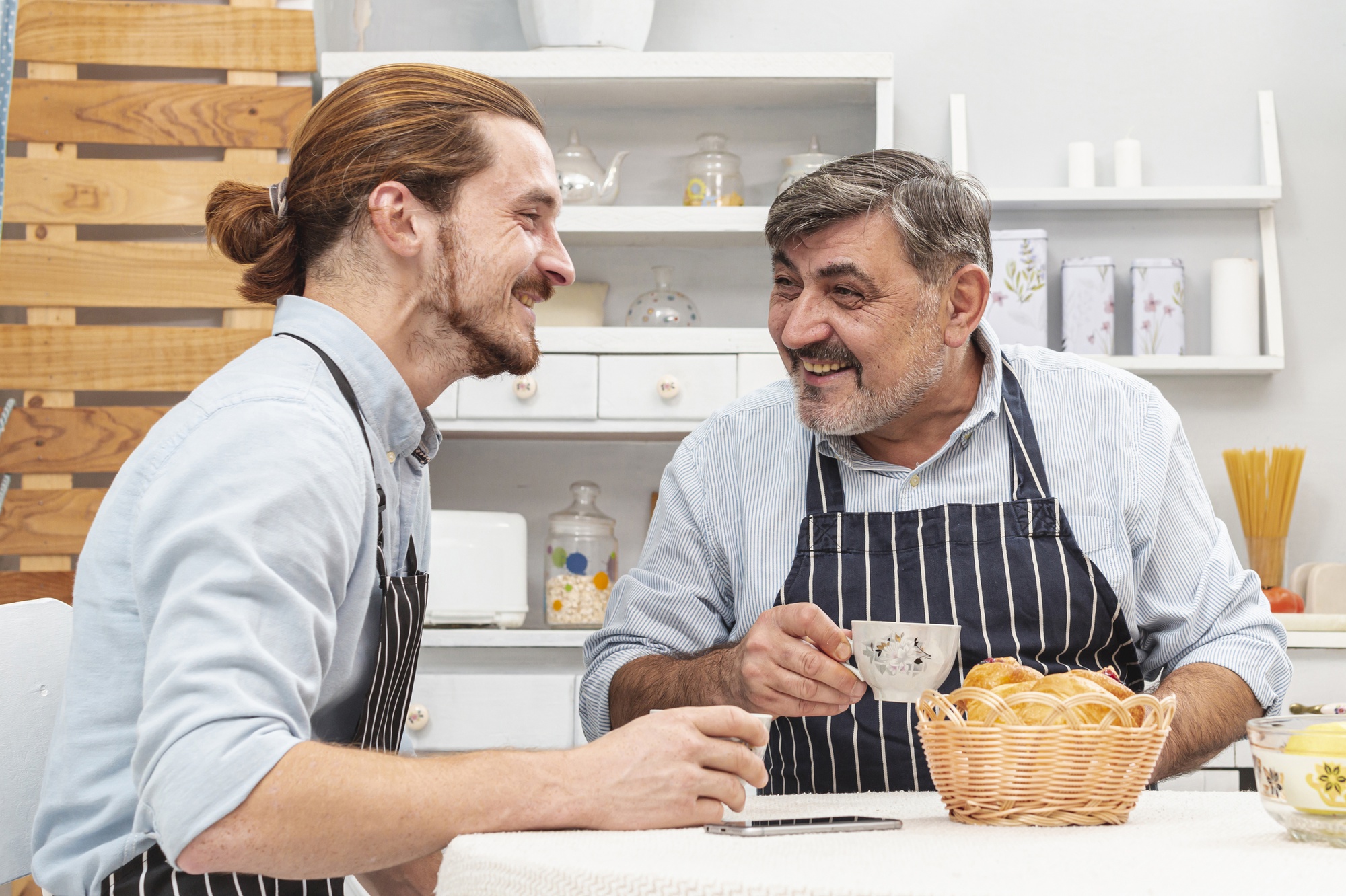 chef speaking with host over a table